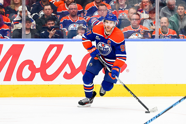 Connor McDavid skates up ice for the Oilers
